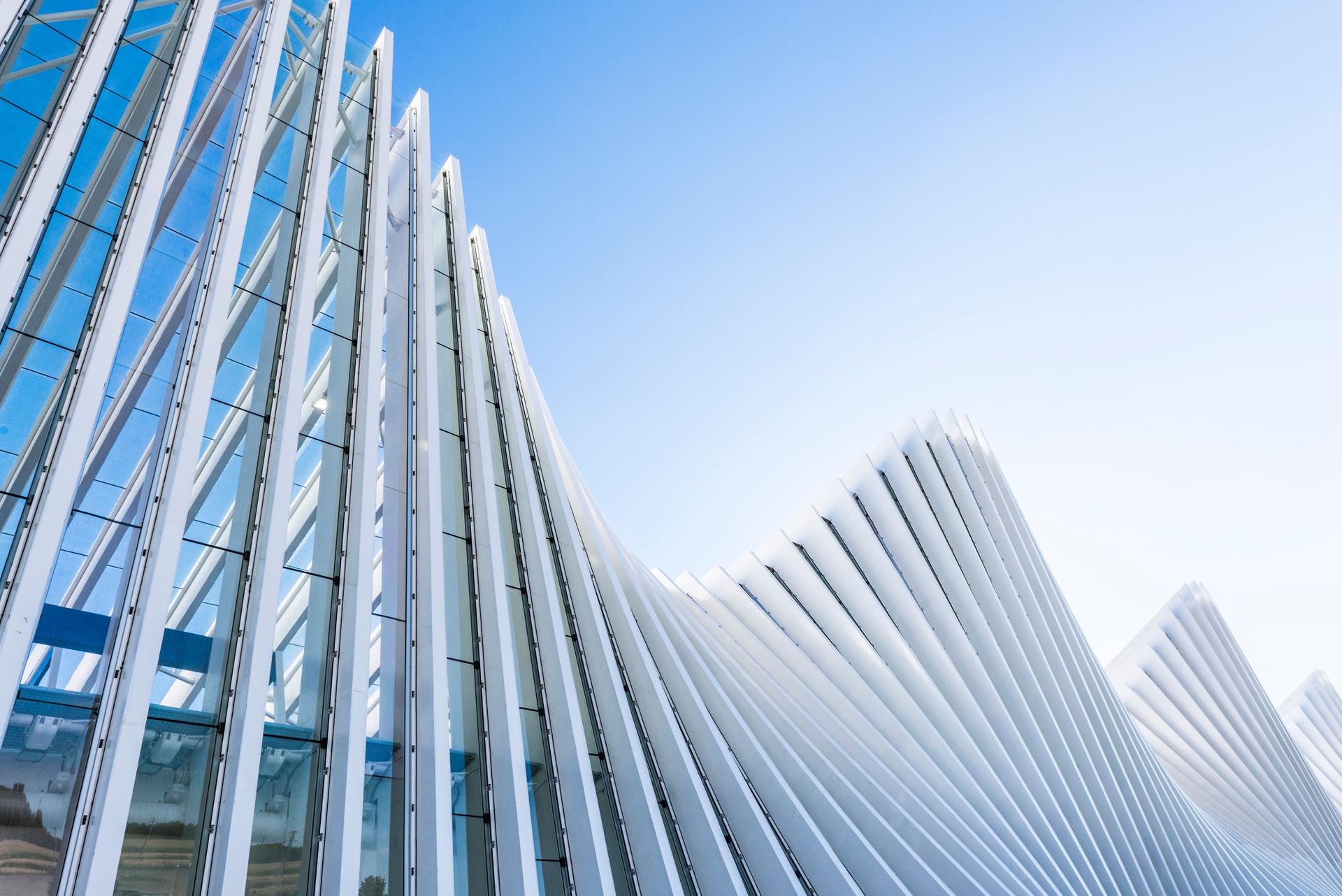 Abstract White Architecture Building on Clear Blue Sky