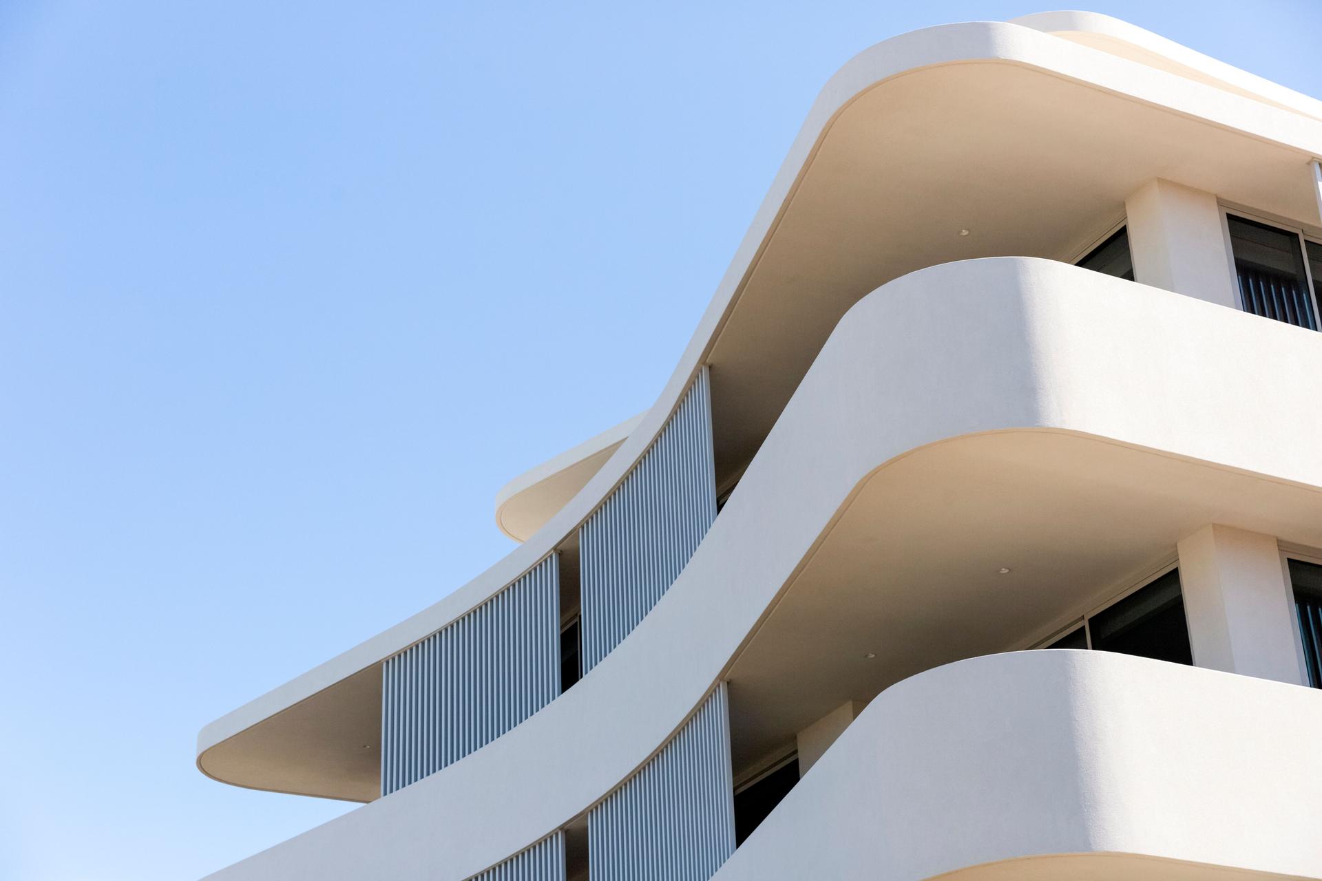 Closeup new, modern apartment building, sky background with copy space